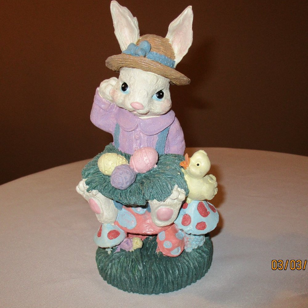 Mrs. Bunny Sitting on a Mushroom.